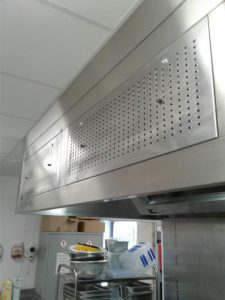 Pictures of the shining clean stainless steel ducting and appliance in the school kitchen.