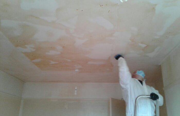Before, during and after photos showing the removal of nicotine deposits in this residential property
